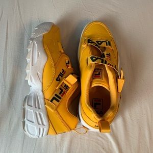 Fila Fast Charge Sneaker In Citrus, Fila Navy, & Fila Red.